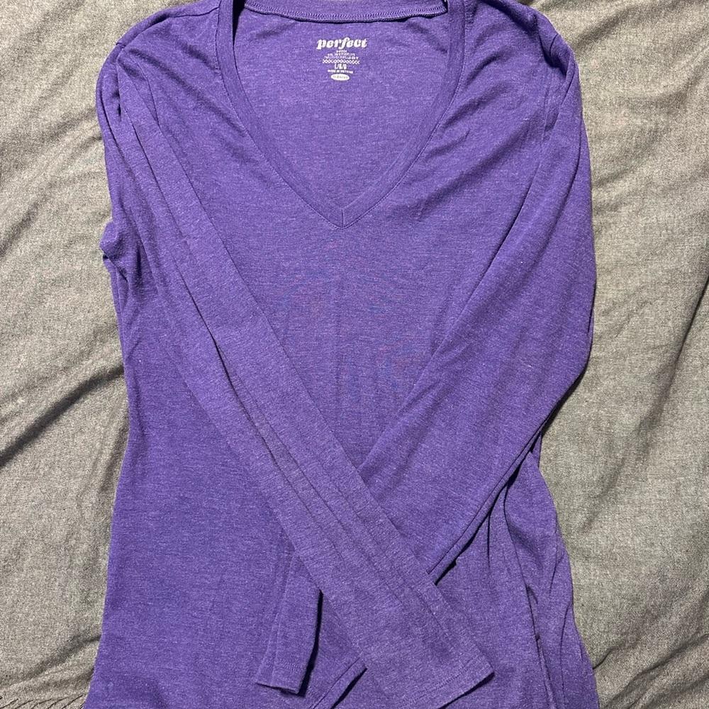 Long sleeve purple shirt.